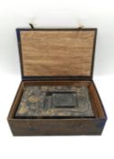 A Chinese calligraphy stone ink block circa 1900, intricately carved in relief with hand painted