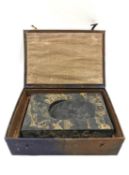 A Chinese calligraphy stone ink block circa 1900, intricately carved in relief with hand painted