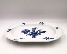 A 19th century blue and white Meissen platter with a central floral design with insects and sprigs