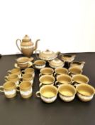 A collection of Wilsons and Wedgwood ceramics, to include ten Drabware teacups and six coffee