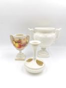 A Royal Worcester heart bud vase/candlestick, along with two twin handled neoclassical style urns,