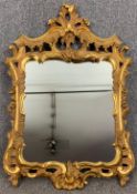 Wall mirror, carved giltwood in the Chinese Chippendale style. H.100 W.67cm