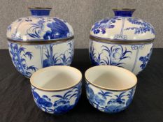 A pair of Chinese blue and white lidded vases along with a pair of similar smaller bowls. H.23cm (