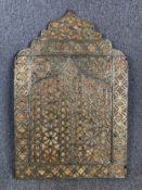 A North African metal clad and bone mirror with arched doors enclosing the plate. H.97 W.65cm