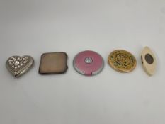 A collection of five vintage tone compacts. Dia.8cm (largest)