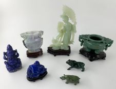 A collection of Chinese, Indian and African stone carvings. H.24cm (largest)