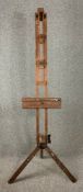 A vintage beech framed artist's studio easel by Winsor and Newton. H.183cm