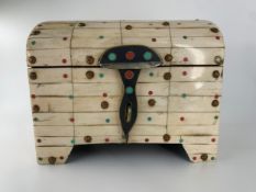 An Eastern bone jewellery casket inlaid with coral and turquoise. H.21 W.26 D.18cm