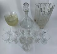 A collection of Finnish studio glass, mostly Nuutajarvi: Vase, decanter, a set of bowls, glasses