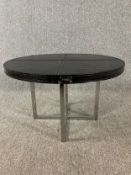 A contemporary Fendi faux crocodile skin coffee table on chrome base. H.38 Dia.61cm