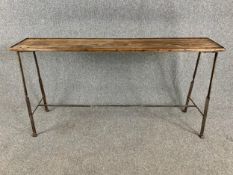 A contemporary wrought metal console table with reclaimed timber top. H.79 W.153 D.29cm