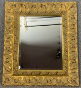 A 19th century style acanthus carved giltwood wall mirror. H.77 W.67cm