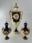 A pair of Coalport lidded urns, C.1900, hand gilded and decorated, marked to base, along with a