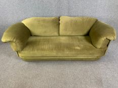 A mid century Heal's two seater sofa upholstered in velour. H.80 W.234 D.100cm
