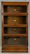 An early 20th century four section oak Globe Wernicke bookcase. H.161 W.87 D.31cm