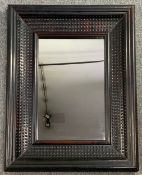 A contemporary moulded frame wall mirror. H.93 W.73cm