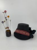 A vintage ladies Salvation Army hat and a collection of vintage hat pins. Dia.21cm (largest)