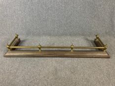 A late 19th century brass fire kerb. W.139 D.38cm