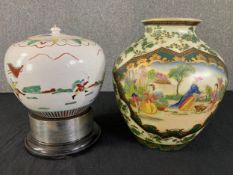 A 19th century Chinese ginger jar on a later presentation stand along with a hand decorated 20th