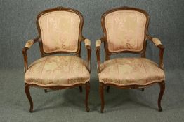 Armchairs, a pair Louis XV style carved walnut. H.86cm. (each).