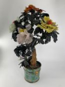A large jade and hardstone model of a bonsai peony tree in cloisonne enamel pot. H.58cm