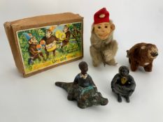 A collection of vintage toys to include a boxed wind-up musical monkey, etc. H.19cm (largest)