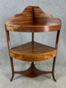 A Georgian mahogany and satinwood inlaid corner washstand. H.103cm