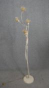 A painted metal standard lamp of naturalistic Art Nouveau form. H.180cm.