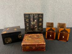 A lacquered Japanese table cabinet, two similar boxes and a pair of inlaid drawers from a Georgian