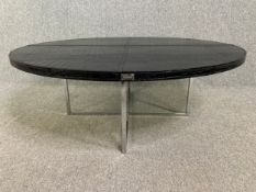 A contemporary Fendi faux crocodile skin coffee table on chrome base. H.46 Dia.121cm