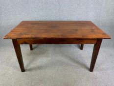 An Eastern hardwood refectory style dining table. H.77 W.160 D.90cm