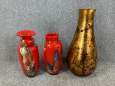 Two art glass vases and a taller glass vase. H.62cm (largest)