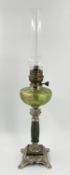 A late 19th century oil lamp with Art Nouveau influence butterfly decoration. H.68cm