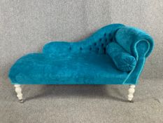 A Victorian style child's chaise longue, painted with deep buttoned velour upholstery. H.71 W.135