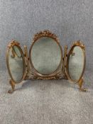 A mid century moulded gilt frame triptych dressing mirror. H.60 W.99cm