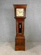 A Georgian oak and mahogany longcase clock with painted dial. H.202cm