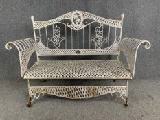 A vintage 19th century style painted iron conservatory or garden two seater bench sofa. H.102 W.