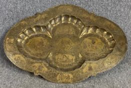 A vintage Indian charger with all over engraved decoration. H.52 W.75cm