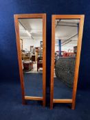 A pair of contemporary dressing mirrors in adjustable hardwood frames. H.160 W.46 D.40cm.