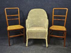 A pair of Edwardian mahogany and satinwood inlaid bedroom chairs along with a vintage loom tub