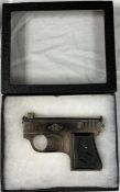 A vintage cased Spanish starter pistol marked Longines.