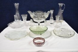 A mixed collection of vintage glassware.