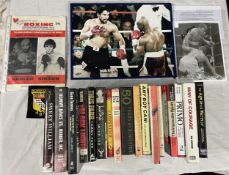 A collection of Boxing books and other memorabilia to include a signed Roberto Duran photograph.