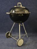 A Weber kettle barbecue. Large size. H.110 W.60 D.60cm.