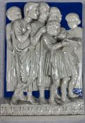 A 19th century Italian majolica glazed tile, figure group in the manner of Luca della Robbia. H.45