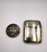 A Edwardian silver cigarette case by F D Long with engraved monogram and gilded interior along