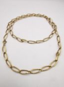 A French 18ct yellow gold textured cable link chain necklace with C-sprung clasp. Stamped with