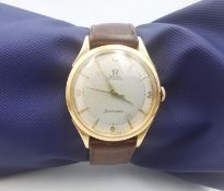 A vintage Gentleman's 18 carat rose gold Omega Seamaster automatic watch on brown leather strap with