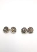 A pair of vintage 14 carat yellow and white metal (tests as platinum) carved mother of pearl and