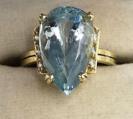 A boxed 18ct yellow gold aquamarine and diamond dress ring by Amsterdam Sauer, set with a drop shape